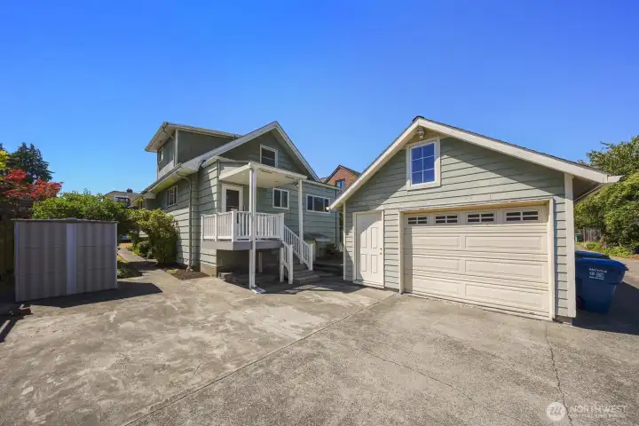 Detached garage with work bench. Alley access and 2 off street parking stalls. Detached garage with work bench. Alley access and 2 off street parking stalls.