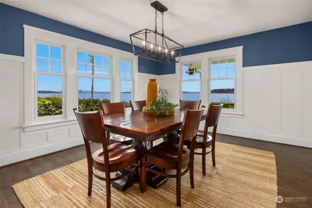 Dining area with views of Mt. Rainier, Puget Sound and Seattle. Hardwood floors replaced in 2018.