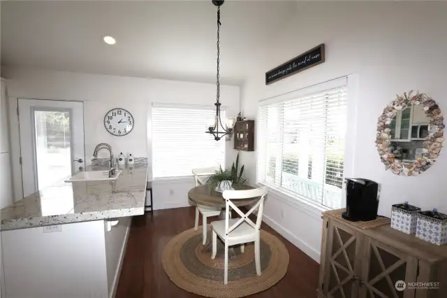 Light & Bright eat-in kitchen with Beautiful granite counter tops.