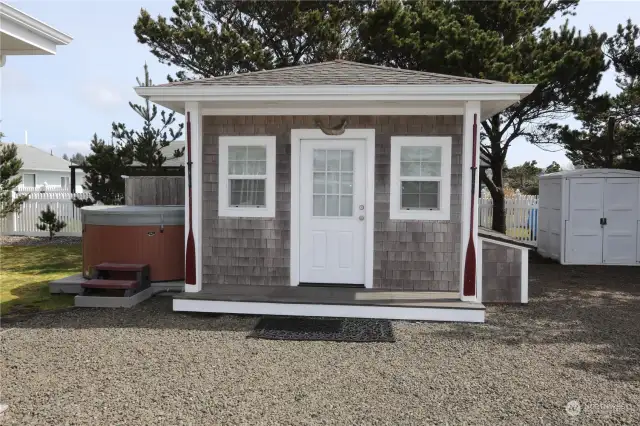 Storage bins surround the studio. Small deck to the side for a nice sitting area or Hot tub. The one shown is not staying.