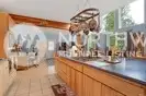 Kitchen with open beam ceiling