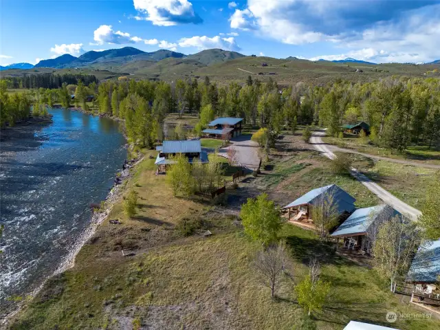 Cabin has a green roof - it is across the road on the right.  You can see the pathway to the Methow River.  The River Run Inn is on the lower right corner.