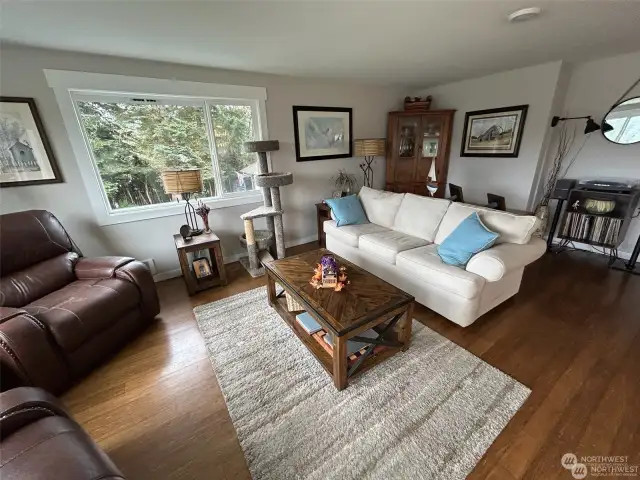 Living room with a sweeping view of Lake Bosworth!