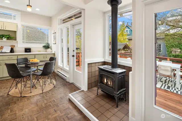 The gas fireplace in the kitchen makes things cozy.