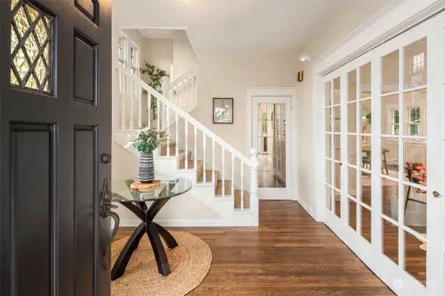 Large foyer greets you, parlor doors lead to the living room or head through leaded doors to your beautiful kitchen! Freshly painted and ready for the next chapter.