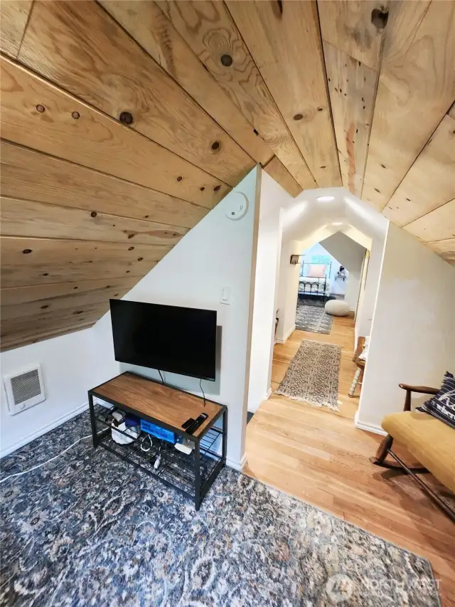 TV in bonus room and more seating.