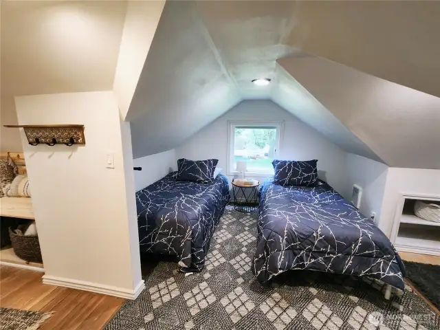 Finally, the extra room being used as more sleeping space.  To the right is another bed.