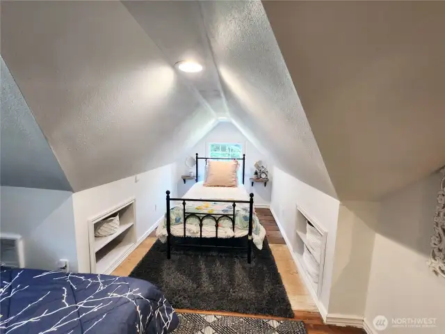 Beautiful linens and little nooks to store clothes, etc.