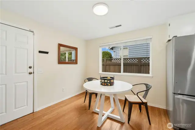 The kitchen's eating nook is a great flex space.