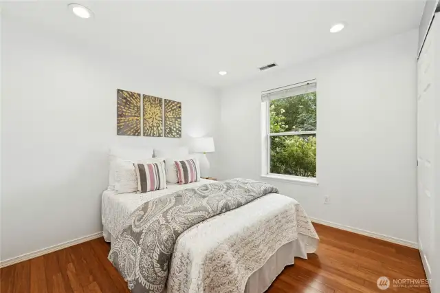 First of the 3 bedrooms. Notice the wood floor throughout.