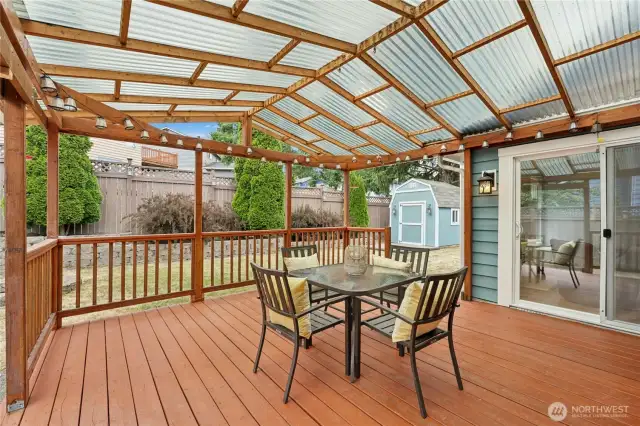 This covered deck lets you enjoy outdoor living year-round! The trex-type material keeps maintenance simple.