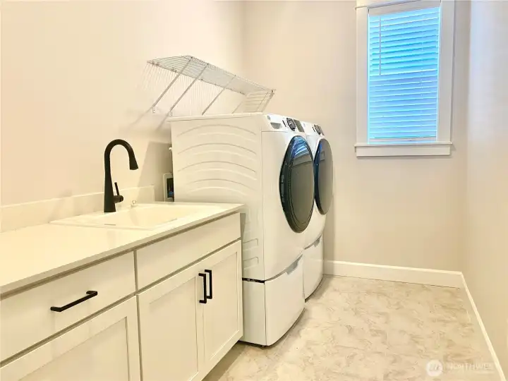 Washer and Dryer with utility sink and cabinets