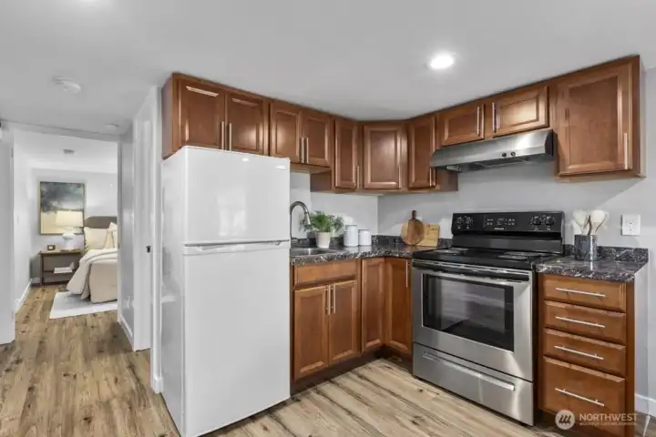 Now in the fully-finished basement with a separate entrance - your 2nd kitchen!