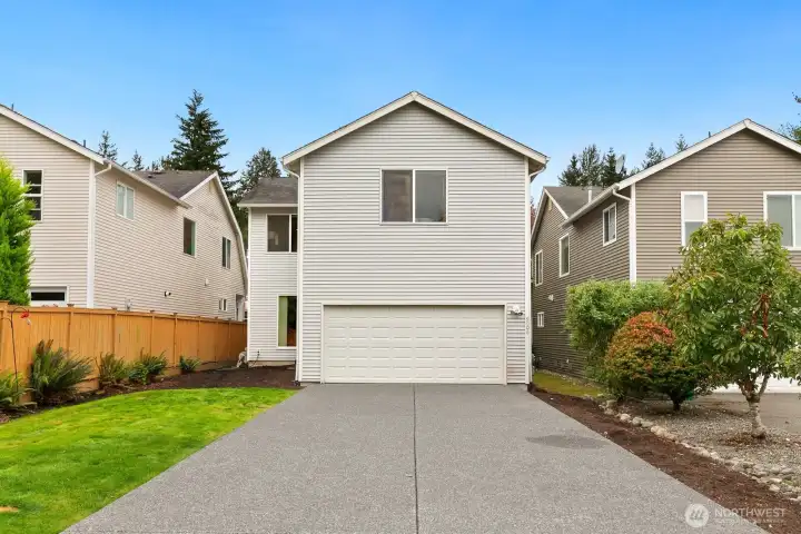 2-Car garage and long driveway.  A great space for learning to bike or playing catch.
