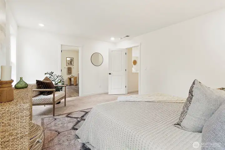 Primary bedroom looking into bathroom suite