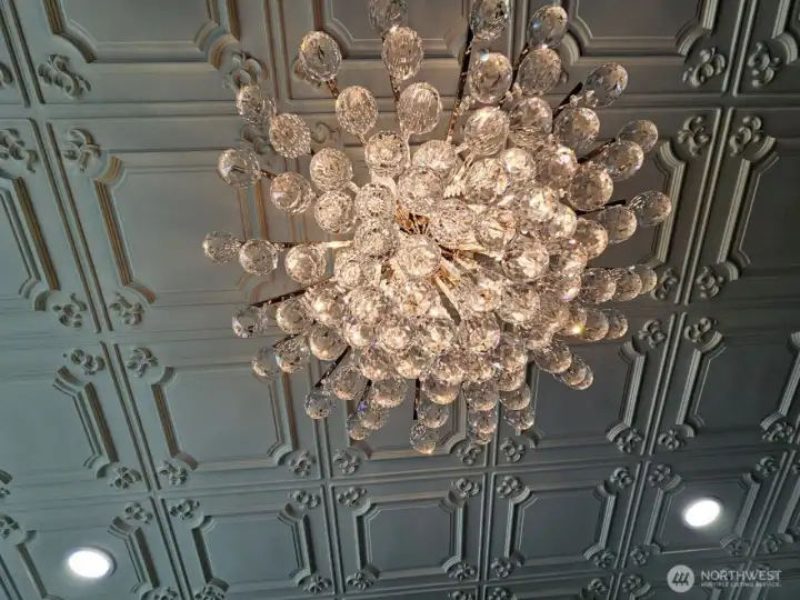 Crystal Chandelier in the Parlor- Much of lighting in this home is restored vintage lighting.