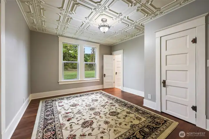 Downstairs bedroom, enter the parlor or the ensuite bath from this room