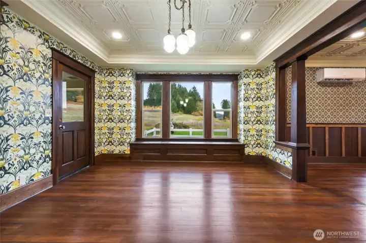 Dining room with window storage/seat lined with aromatic cedar