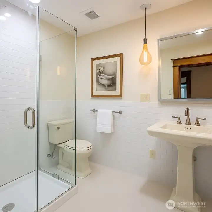 Main upstairs bath with attached sauna- virtually staged