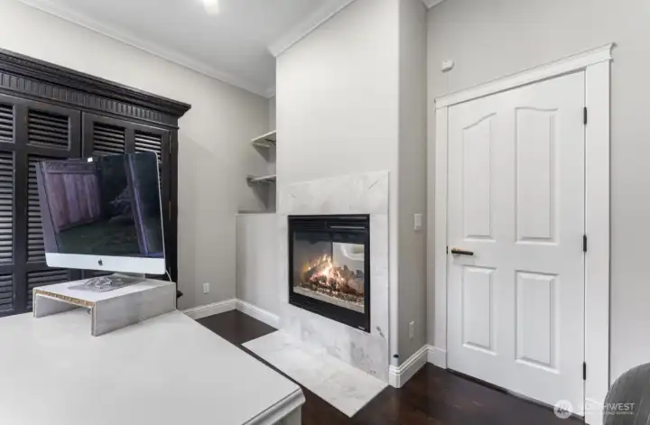 Office includes a gas fireplace