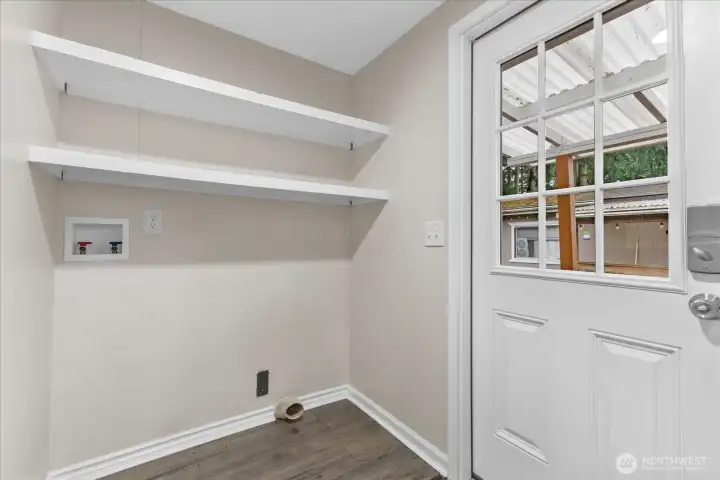 Laundry room with backyard access