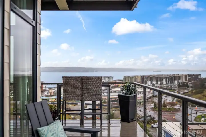 Corner wrap-around deck accessed from DR, LR, and Primary Suite