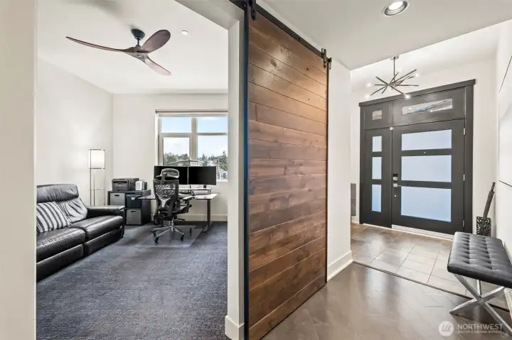 Large den/study/office off entry with barn door for privacy...
