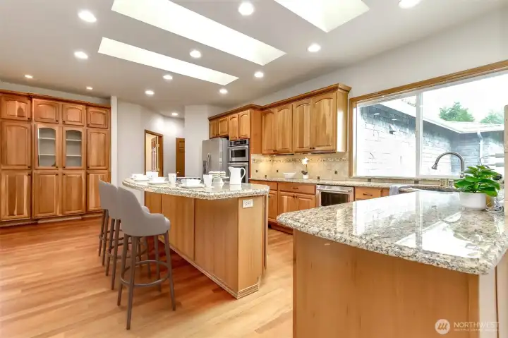 Solid surface counters and gourmet island are perfect for entertaining!