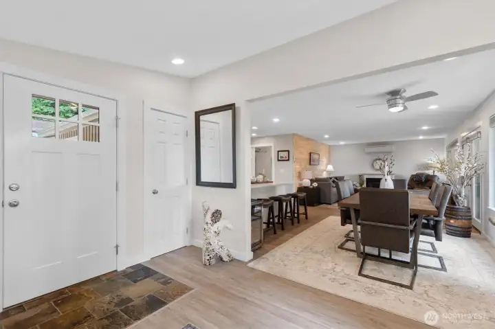 Wide open living from the entry to the Great Room passing the Dining Room and Kitchen.