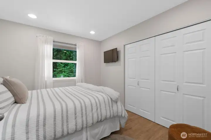 Plenty of room for a Queen bed in the Second Bedroom with large closet space.
