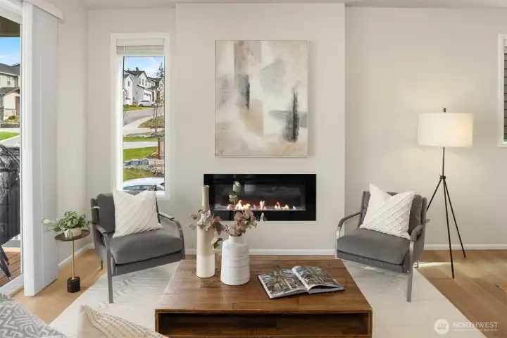 Living Room with Fireplace Moment and Sliding Door that Walk Out to Large Covered Deck