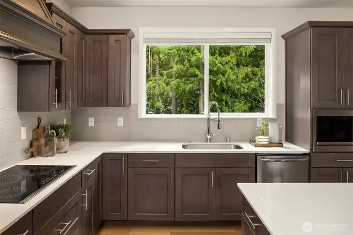 iKitchen looks out over serene green space and back yard.