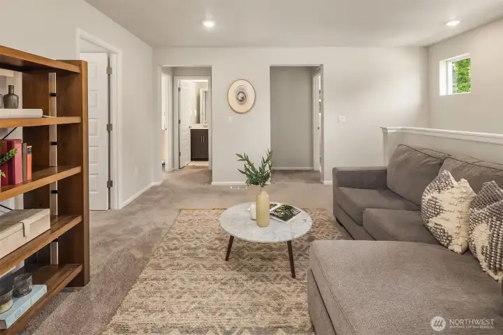 Seating area on top floor with access to laundry and full bathroom.