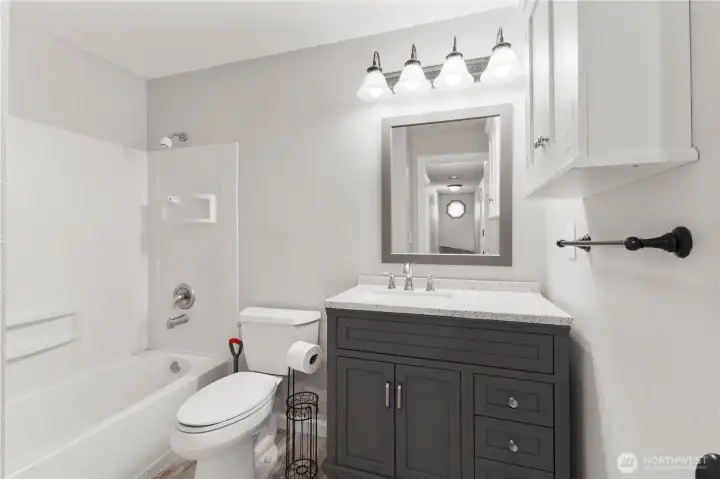 Full Bathroom on upper level with tub, and shower.