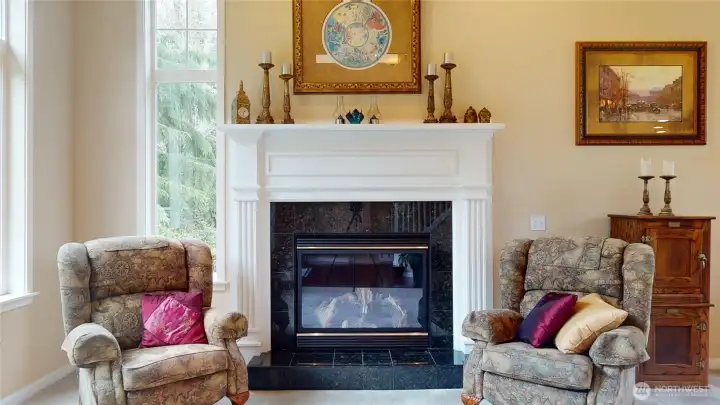 A gas fireplace is the focal point of the living room