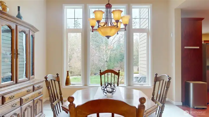 A huge wall of windows becomes the backdrop to your dining experience