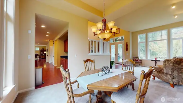 The kitchen is smartly placed by the formal dining room