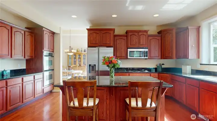A massive center island becomes the focal point of the kitchen, allowing ease of entertaining