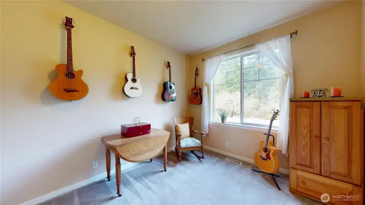 The den faces the front of the home and is easily found to the right of front door