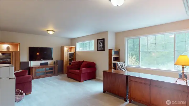 The bonus room can be found upstairs at the end of the hallway