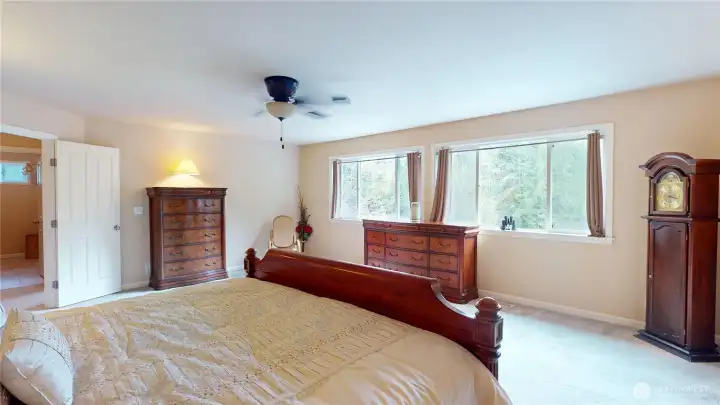 This primary bedroom faces the back of the property