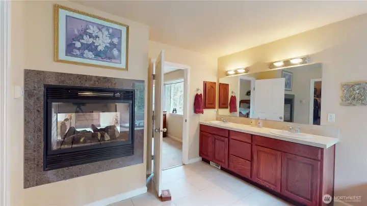 The most unique feature in the ensuite is the double sided gas fireplace
