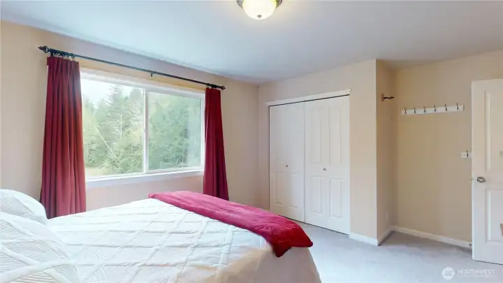 The third of three bedrooms faces the backyard