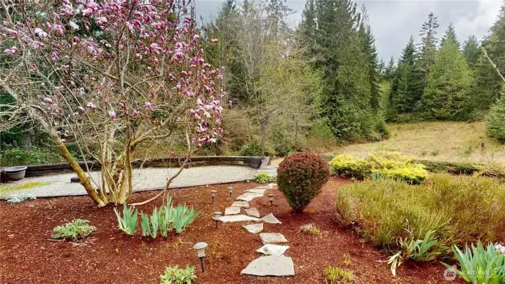 Gorgeous PNW landscaping surrounds the property
