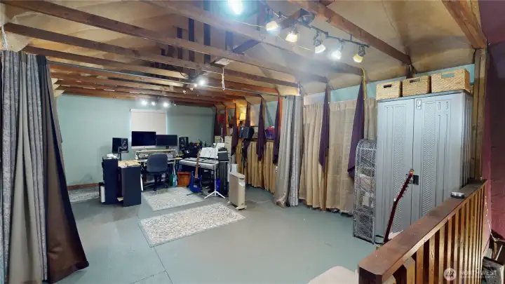 The studio above the detached garage is currently being used as a sound studio