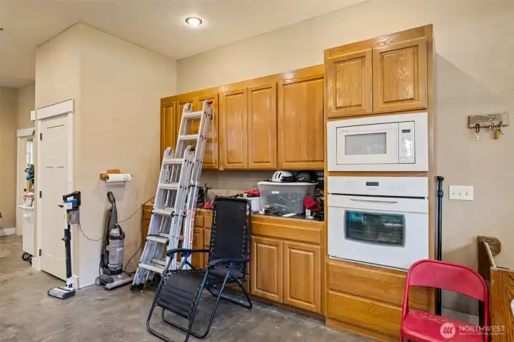 Partially installed kitchen in garage
