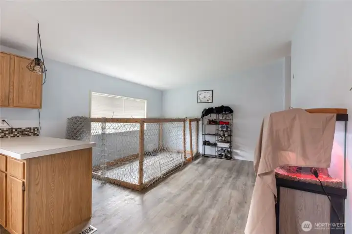 Large dining area; pet crate will be removed prior to closing.