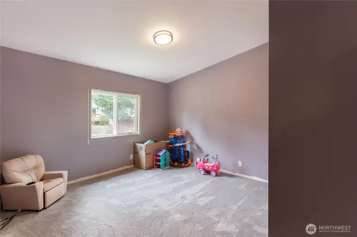 Second bedroom – bright and spacious with plenty of natural light and large closet space.