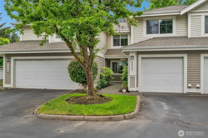 Welcoming townhome with an attached 1 car garage featuring a California Closet storage system.