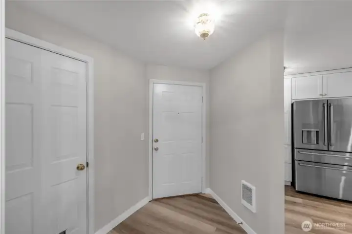 Looking towards the front entry. The door at the left opens to the garage.